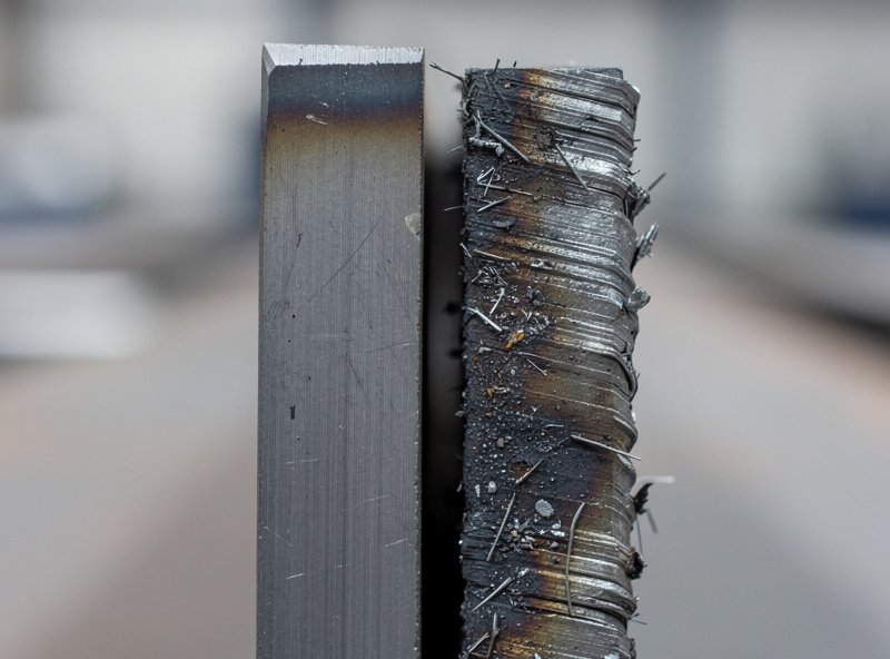 Comparison of plasma cut edge versus angle grinder cut edge on steel plate