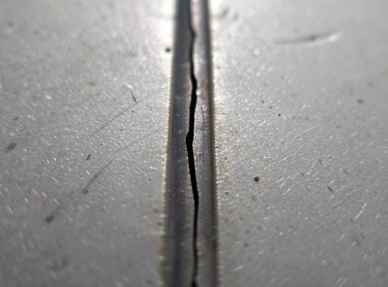 Longitudinal centerline crack running down a steel weld bead