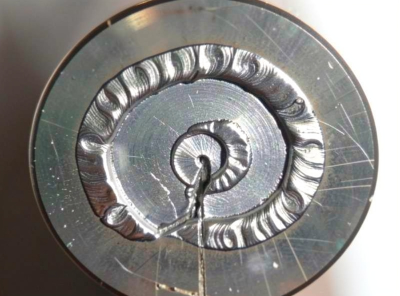 Cross-section view of a multipass tube weld showing a root pass, fill passes, and a finished cap