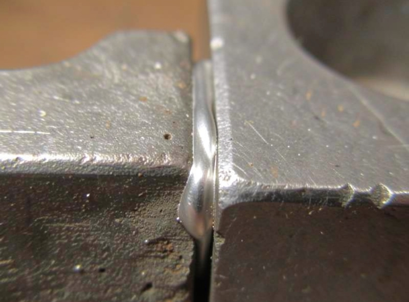 Finished silver-brazed joint with a clean bright thin silver fillet between two steel parts